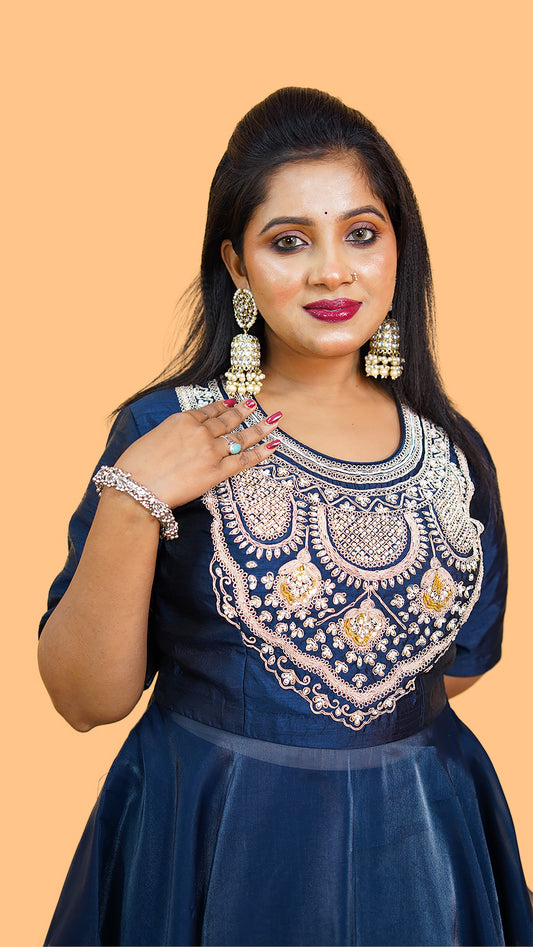 LEHENGA AND PEPLUM SET WITH HAND EMBELLISHMENT ON THE NECK AND SKIRT IN TISSUE FABRIC