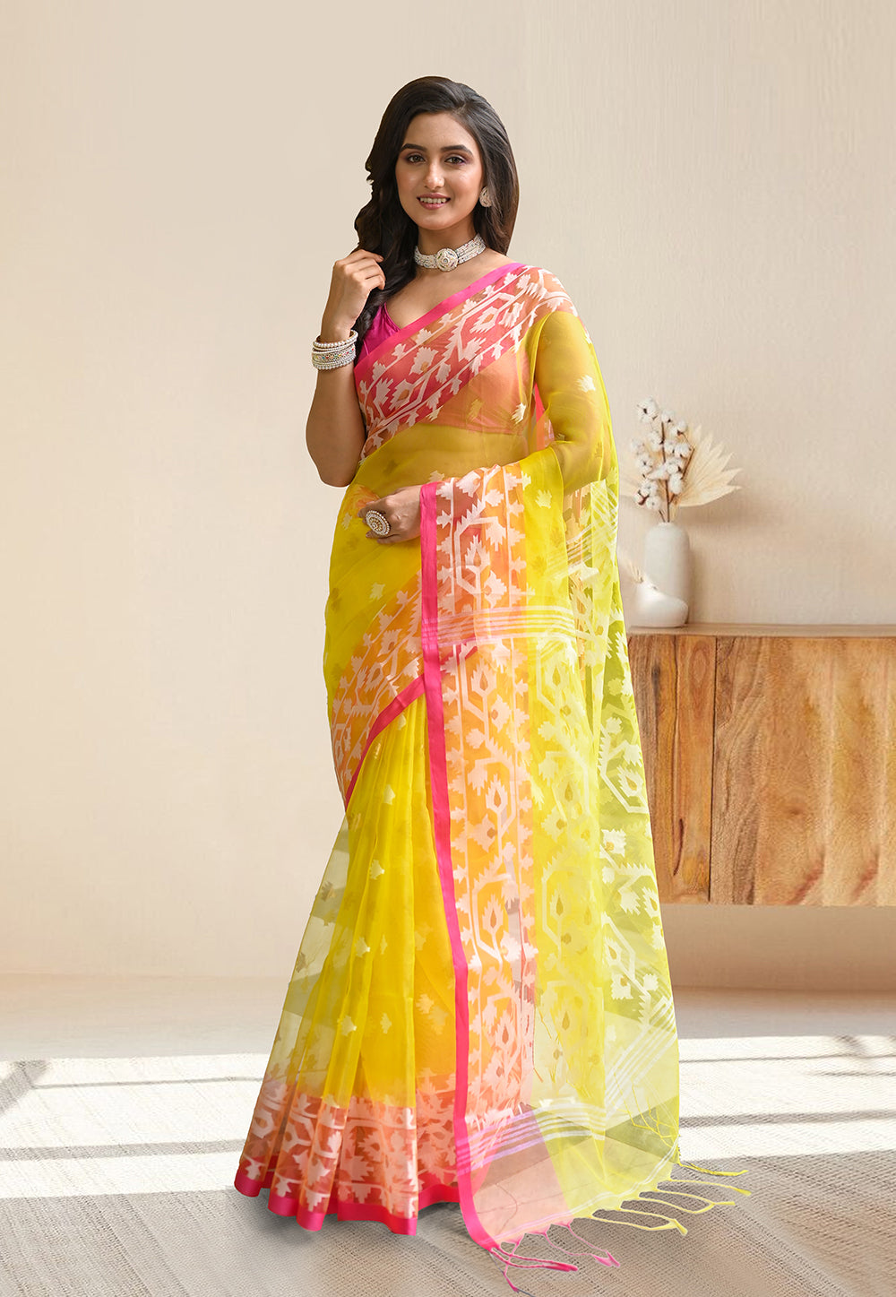 PURE HANDWOVEN MUSLIN SILK SAREE IN YELLOW COLOR WITH OFFWHITE FLORAL MOTIFS AND PINK BORDER