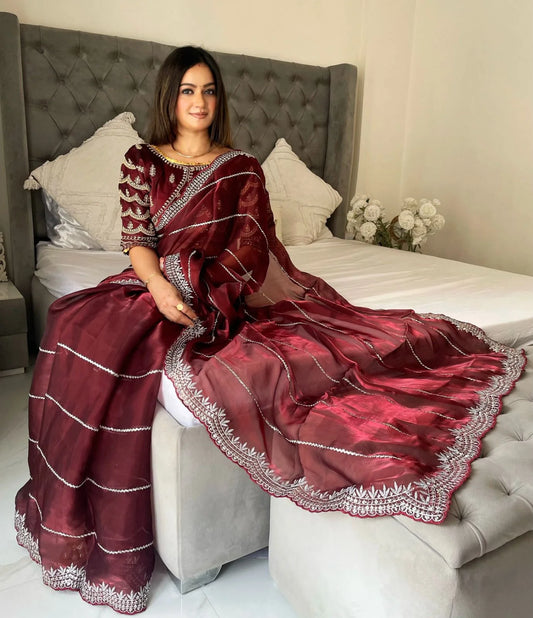 JIMMY CHOO SAREE IN MAROON COLOR WITH SEQUIN EMBROIDERY  Including Ready To Wear Blouse