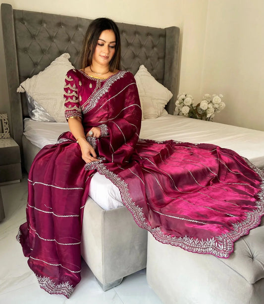 JIMMY CHOO SAREE IN MAGENTA COLOR WITH SILVER SEQUIN EMBROIDERY  Including Ready To Wear Blouse