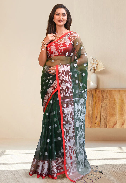 PURE HANDWOVEN MUSLIN SILK SAREE IN  FOREST GREEN COLOR WITH OFFWHITE FLORAL MOTIFS AND RED BORDER